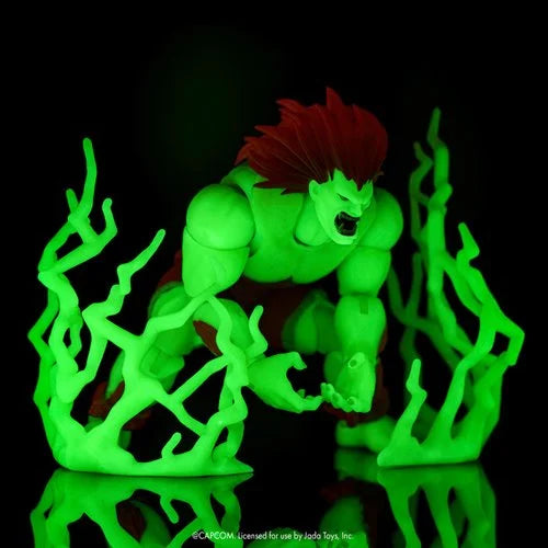 Green superhero figure with red hair on a black background